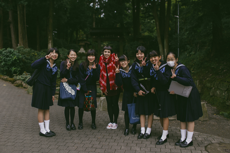 Group of Japanese teenage students at Kamakura - The cat, you and us